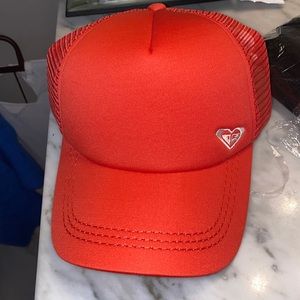 Orange/pink hat. Never worn